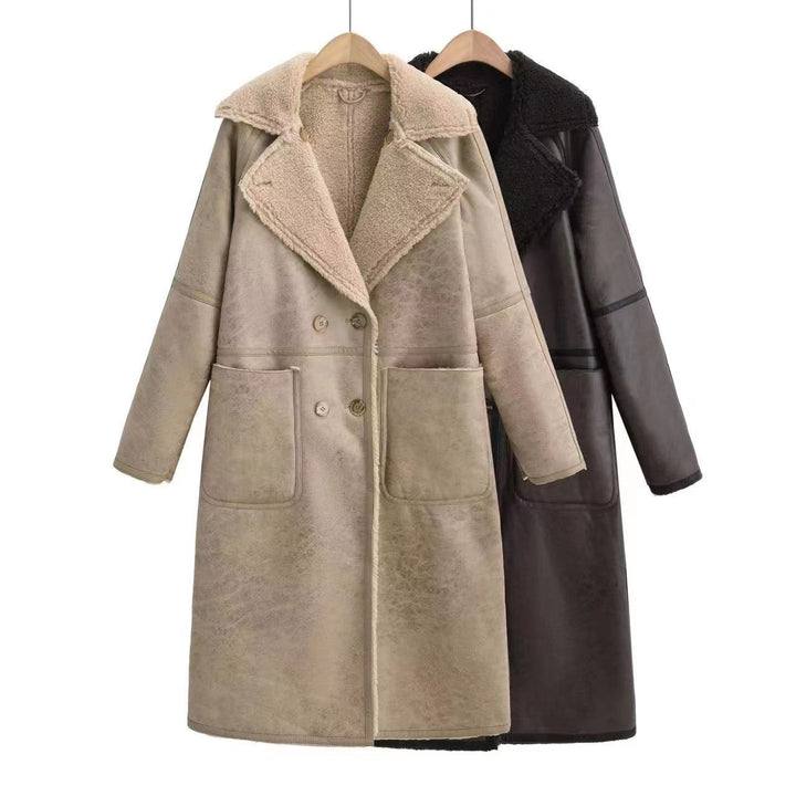Woman in a long double-breasted belted coat
