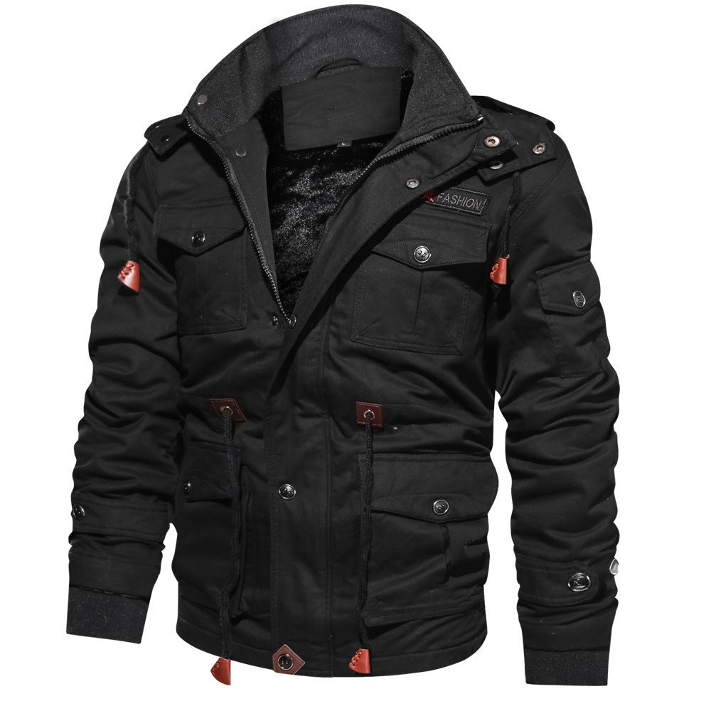 Man wearing a hooded military-style jacket