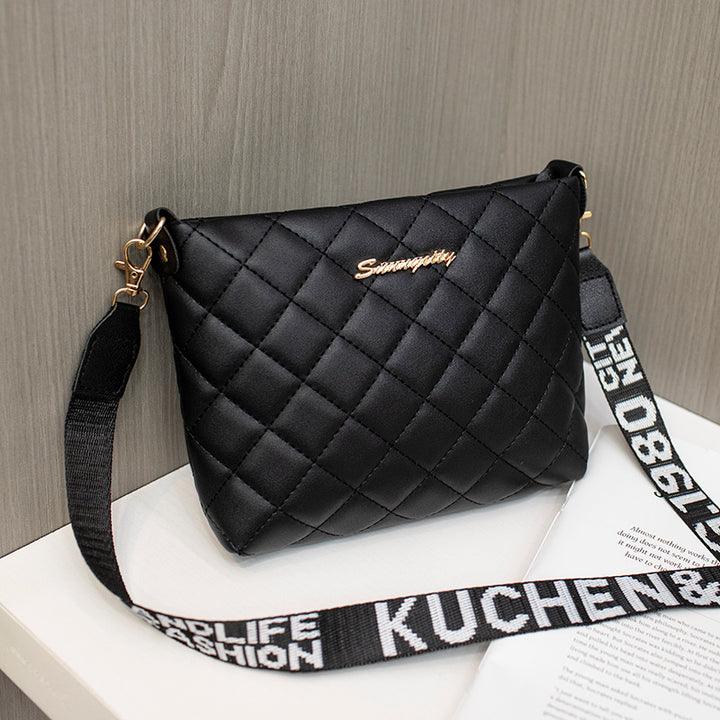 Small quilted crossbody bag with wide strap