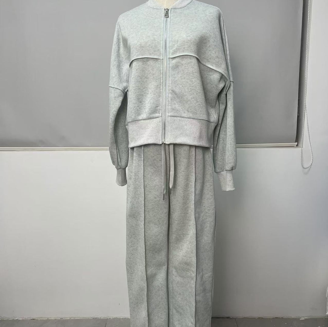 Woman in a zip jacket and wide-leg trousers set