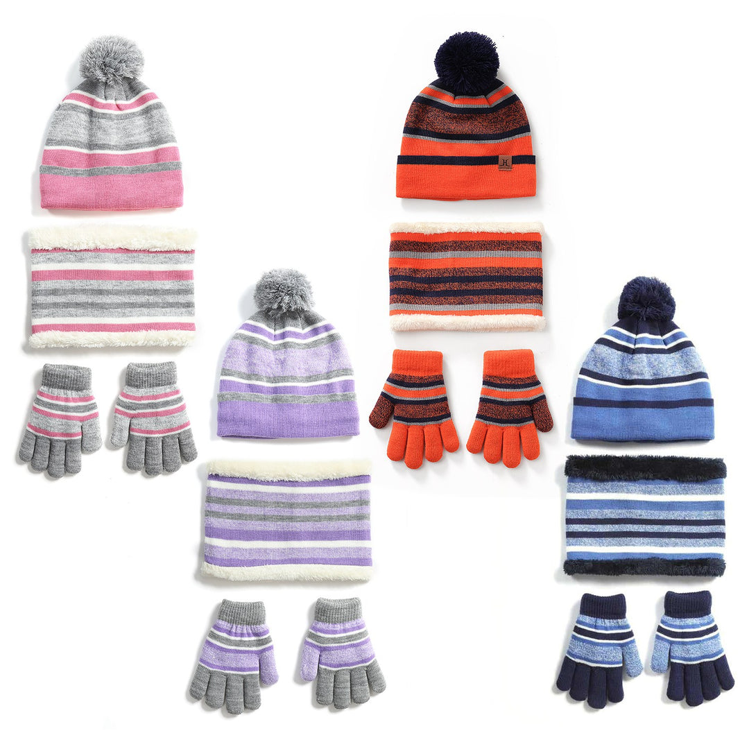 Child wearing striped pompom hat, snood and gloves