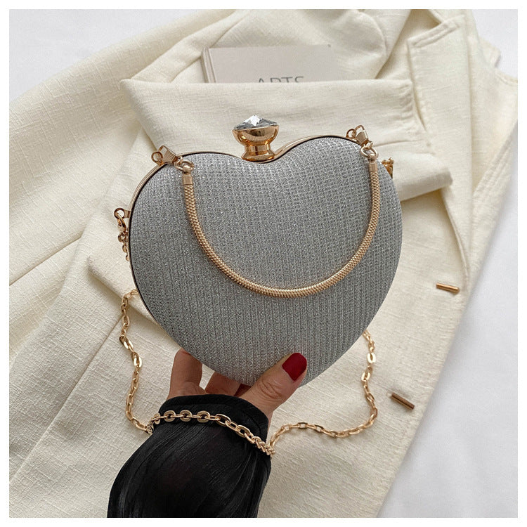 Heart-shaped evening clutch with chain