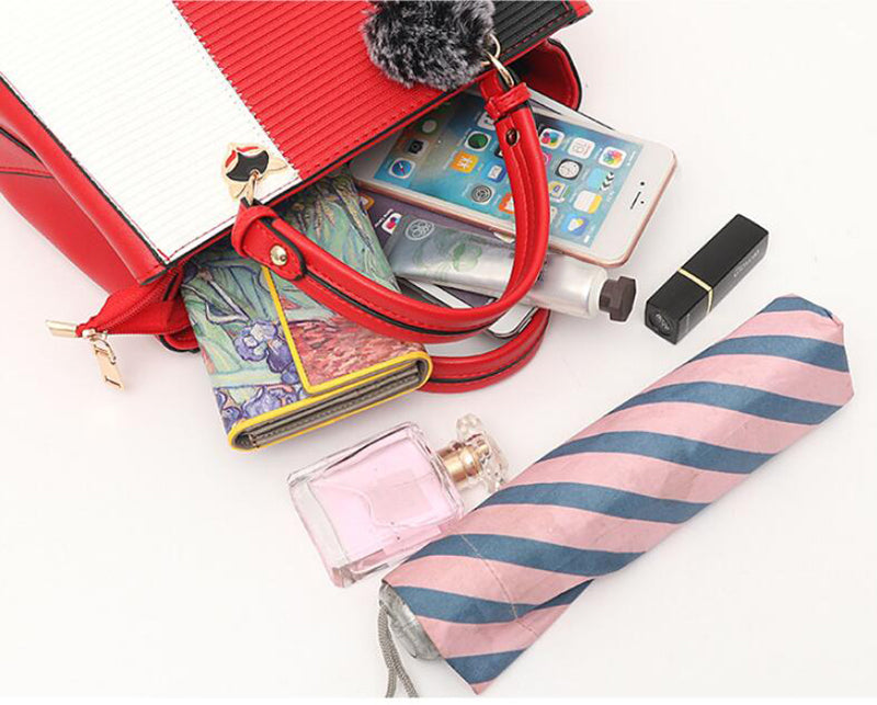 Colour-block handbag with pompom charm
