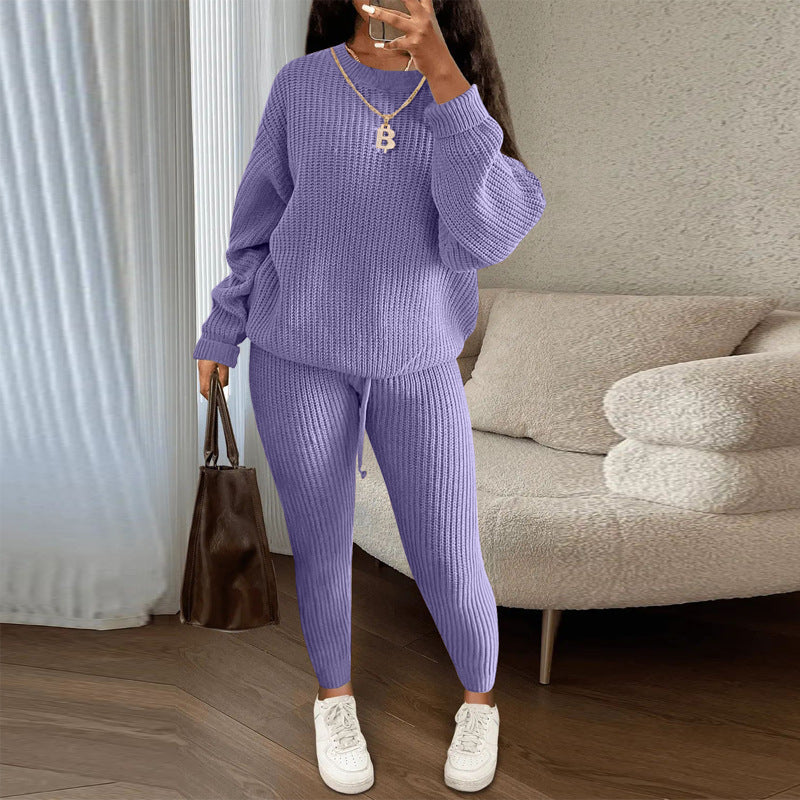 Woman in ribbed knit jumper and trousers set