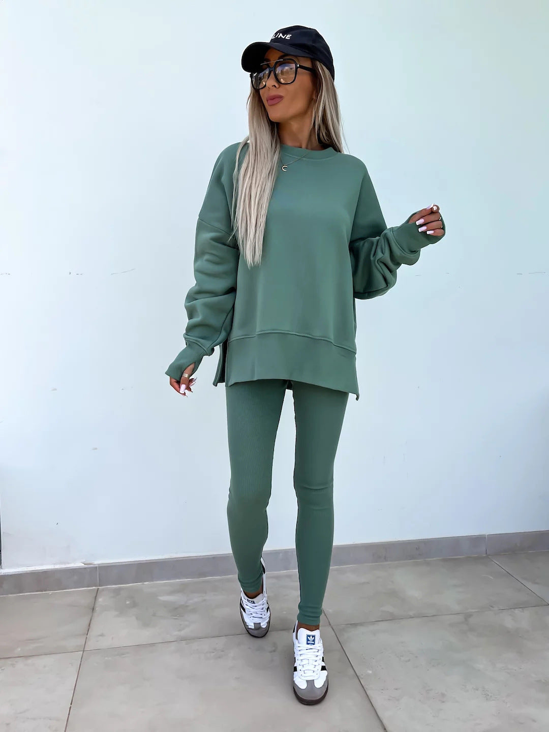 Loose split-hem jumper and fitted trousers knit co-ord