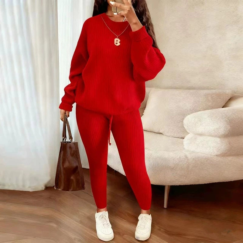 Woman in ribbed knit jumper and trousers set