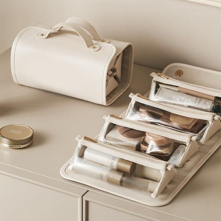 Foldable travel toiletry bag with clear pouches